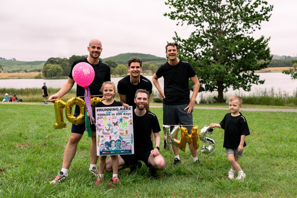 Image of Tim with others for Running Rare after completing 100km of running