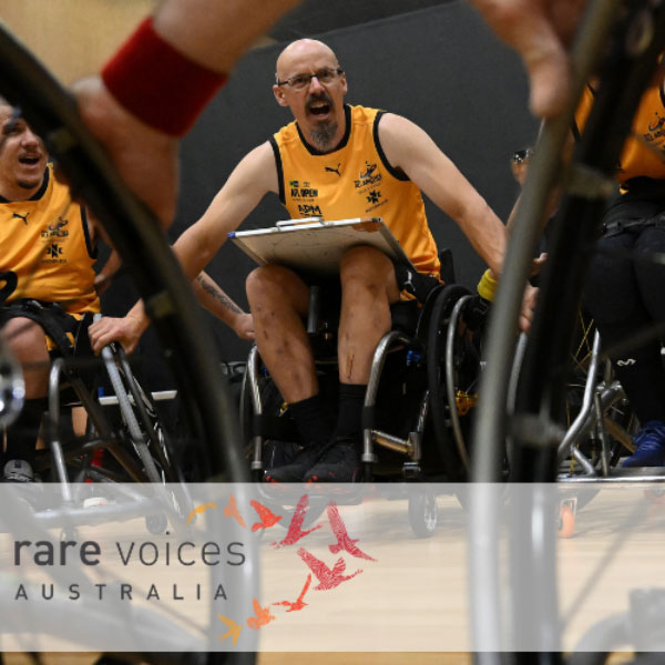 Image of Ryan in a wheelchair in a green and gold Australia uniform