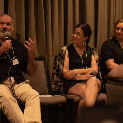 2025-Highlights-3 Panelists at the Showcase speaking