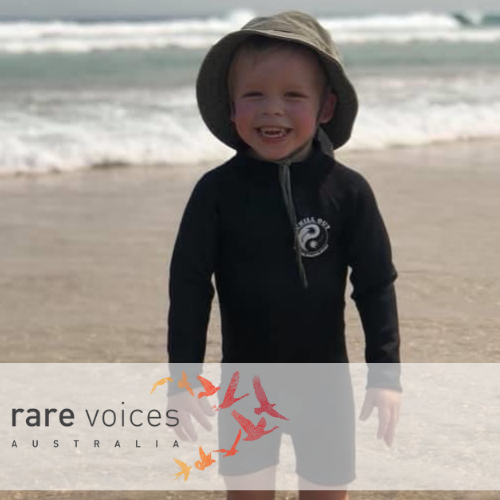 Hudson smiling at the beach